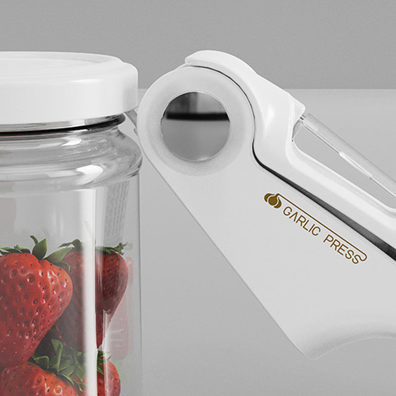 Heavy-duty stainless steel garlic press, efficient kitchen food prep gadget.