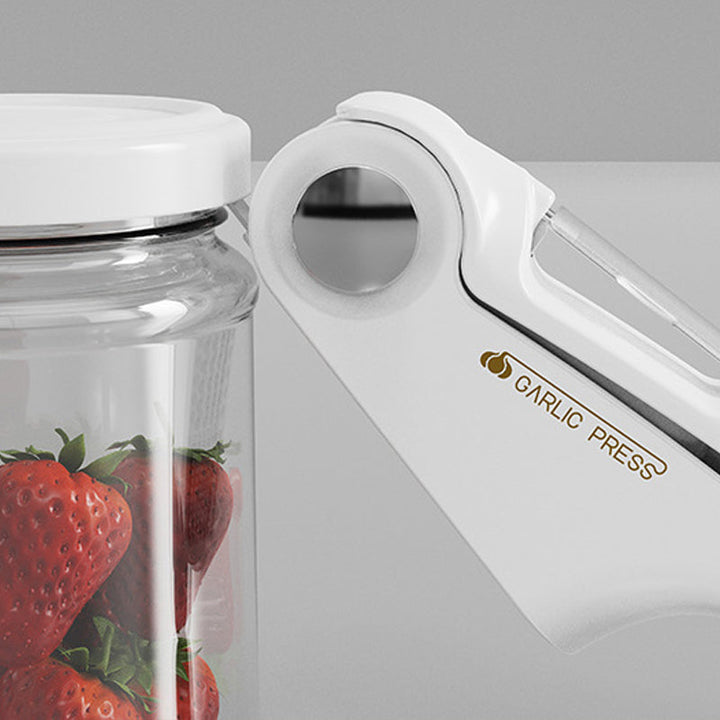 Heavy-duty stainless steel garlic press, efficient kitchen food prep gadget.