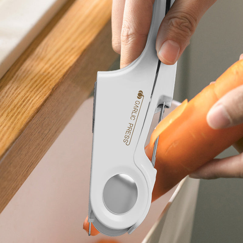 Sleek stainless steel garlic press, modern kitchen gadget for quick crushing.