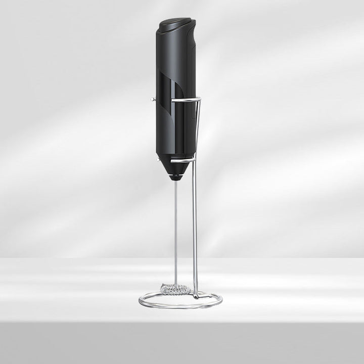 Kitchen milk frother, handheld and made of durable stainless steel, comes with a stand