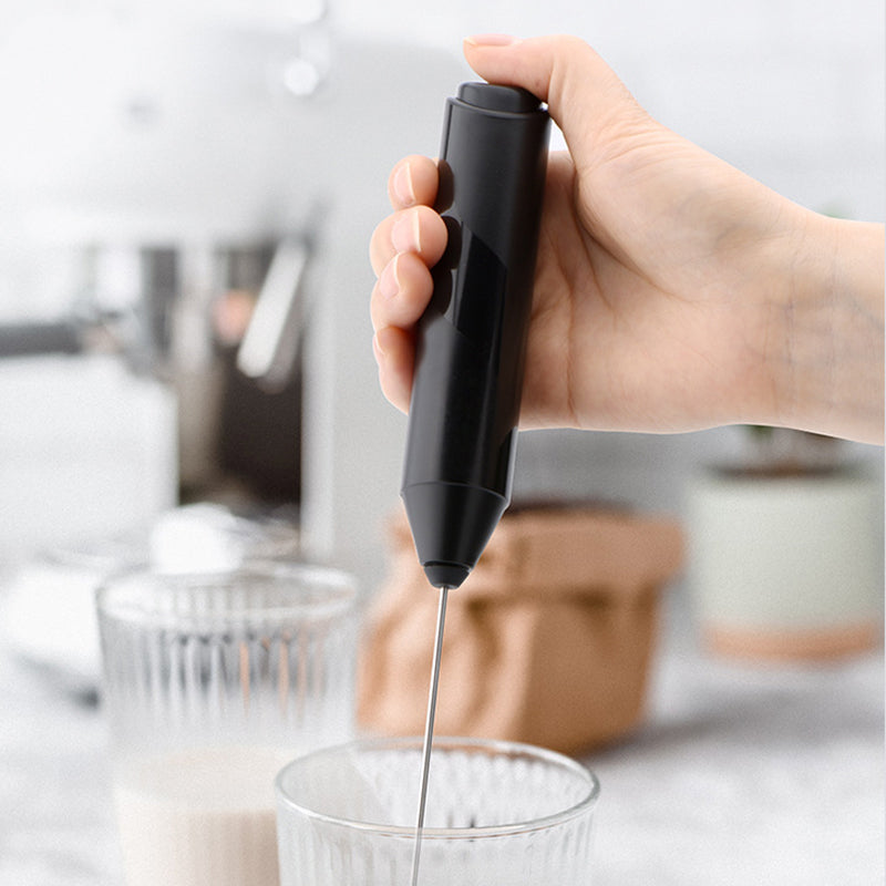 Frother for milk, handheld design with a convenient stand, great for home baristas