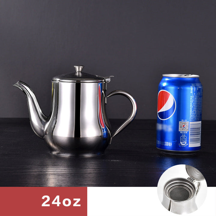 Image demonstrating oil being poured from the stainless steel dispenser through its fine mesh strainer.