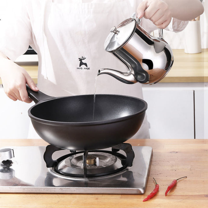 A versatile stainless steel oil container, suitable for home kitchen, restaurant, and commercial use.