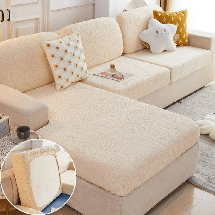 Close-up of the breathable, soft polyester fabric of the wear-resistant sofa cover, ideal for daily use.