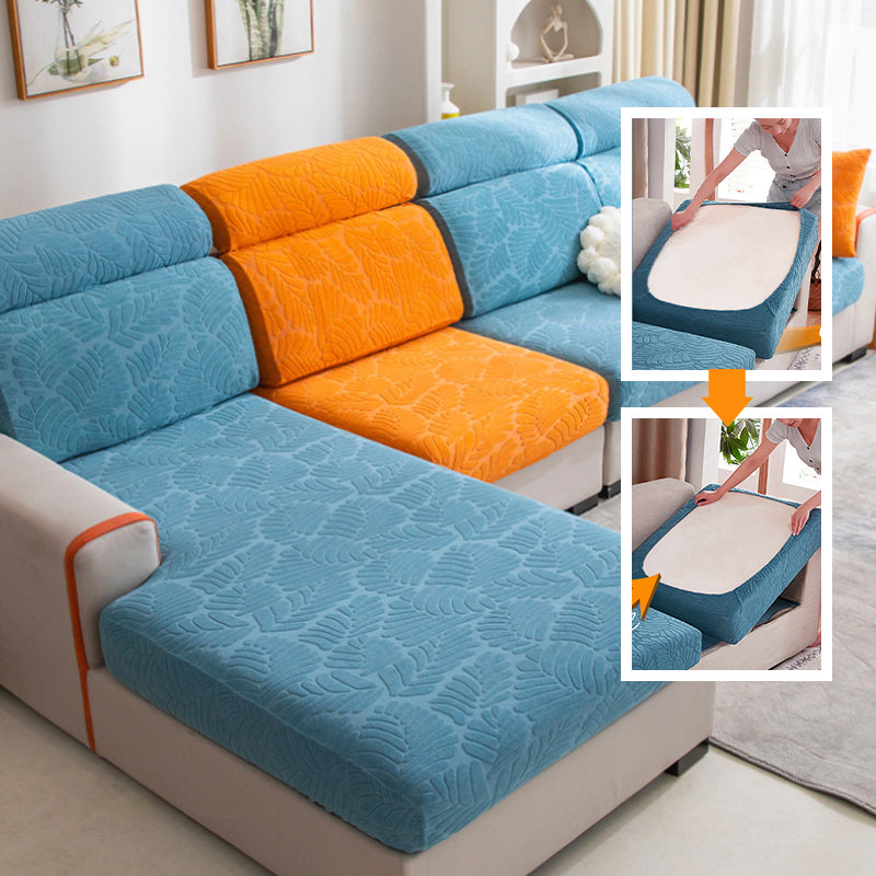 Close-up of the textured, wear-resistant fabric of a universal stretch sofa cover, perfect for home decor.