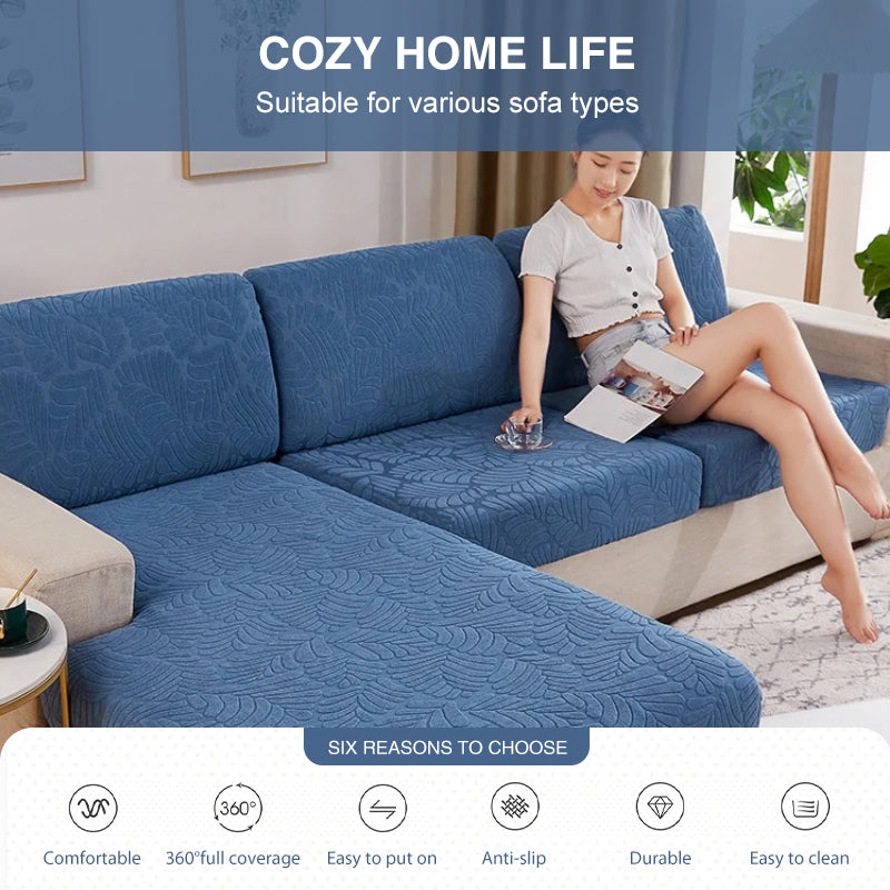 Universal sofa cover in a vibrant blue, snugly fitted on a three-seater couch, ideal for a pet-friendly home.
