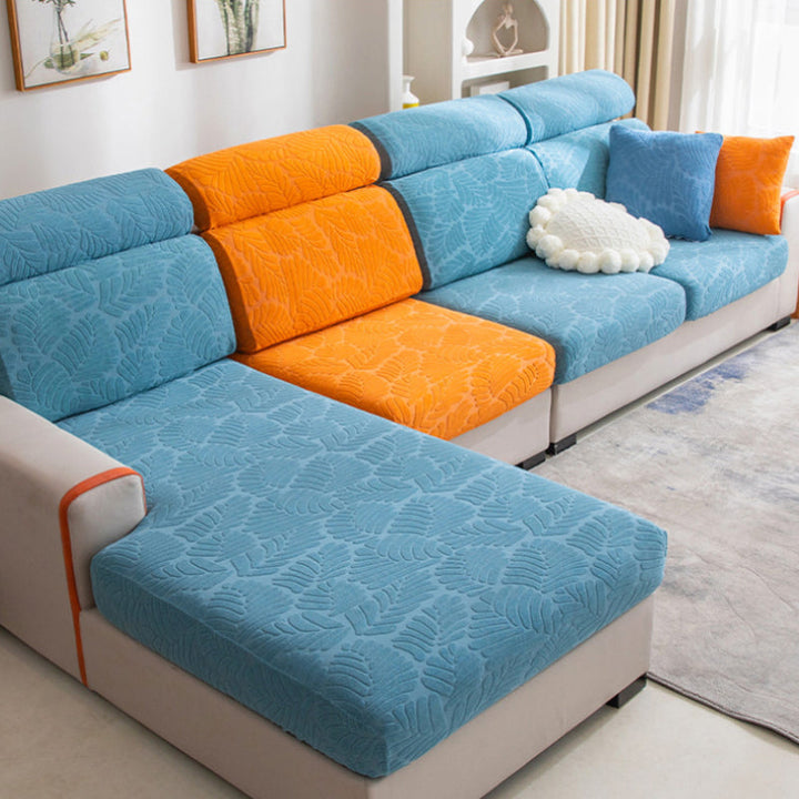Detail shot of the elastic band and anti-slip features of the stretchable universal couch cover.