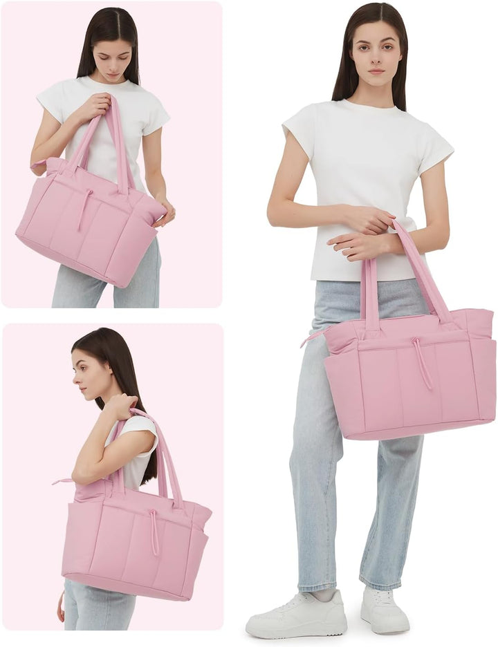 Black quilted laptop travel tote, featuring a convenient cup holder & luggage sleeve.