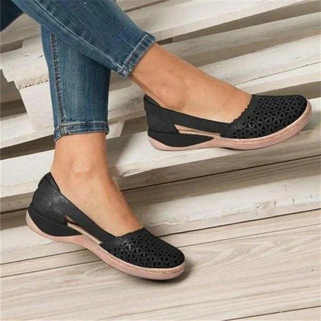 Easy slip-on black women's flats, perfect walking shoes. Designed for bunion relief, comfort, and arch support.