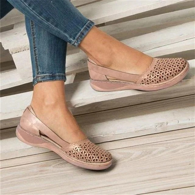 Black women's comfort flats with ergonomic design, arch support & wide toe box for bunion relief & foot health.