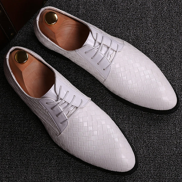 Elegant men's lace-up dress shoes with a sleek design, ideal for special occasions & sophisticated fashion.