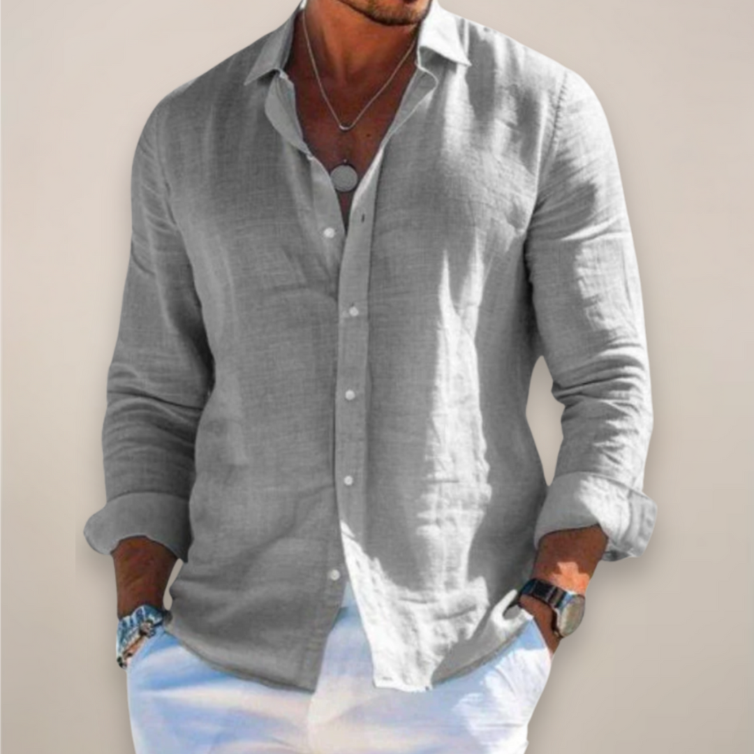 Stylish men's long sleeve button-up shirt in solid color, perfect for all seasons & versatile casual wear.