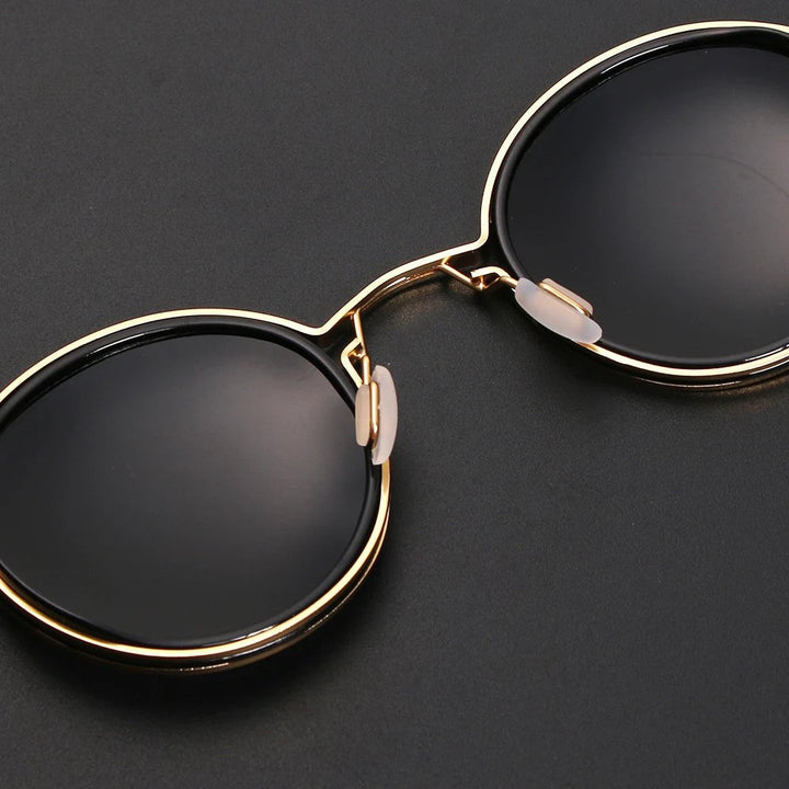 Modern men's polarized eyewear featuring a double bridge and sturdy metal frame, perfect for outdoor style.