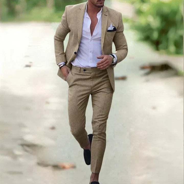 Back view of a tailored men's slim fit suit, emphasizing the precise cut & elegant silhouette for formal events.