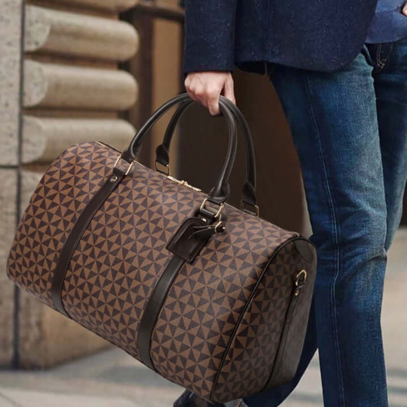 Black unisex duffle bag, spacious carry-on for business travel, gym, or weekend adventures.