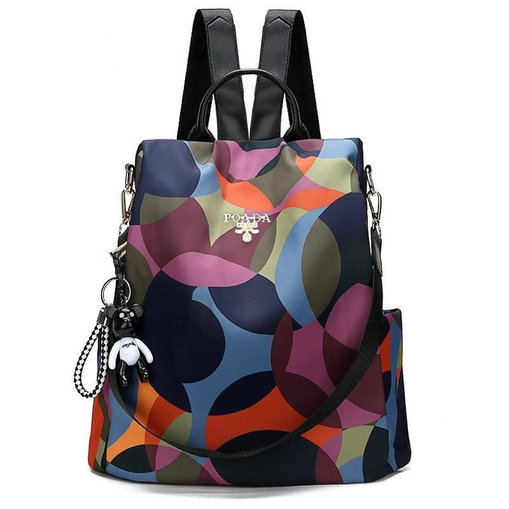 Stylish women's anti-theft water-resistant backpack, perfect for daily commute & travel.