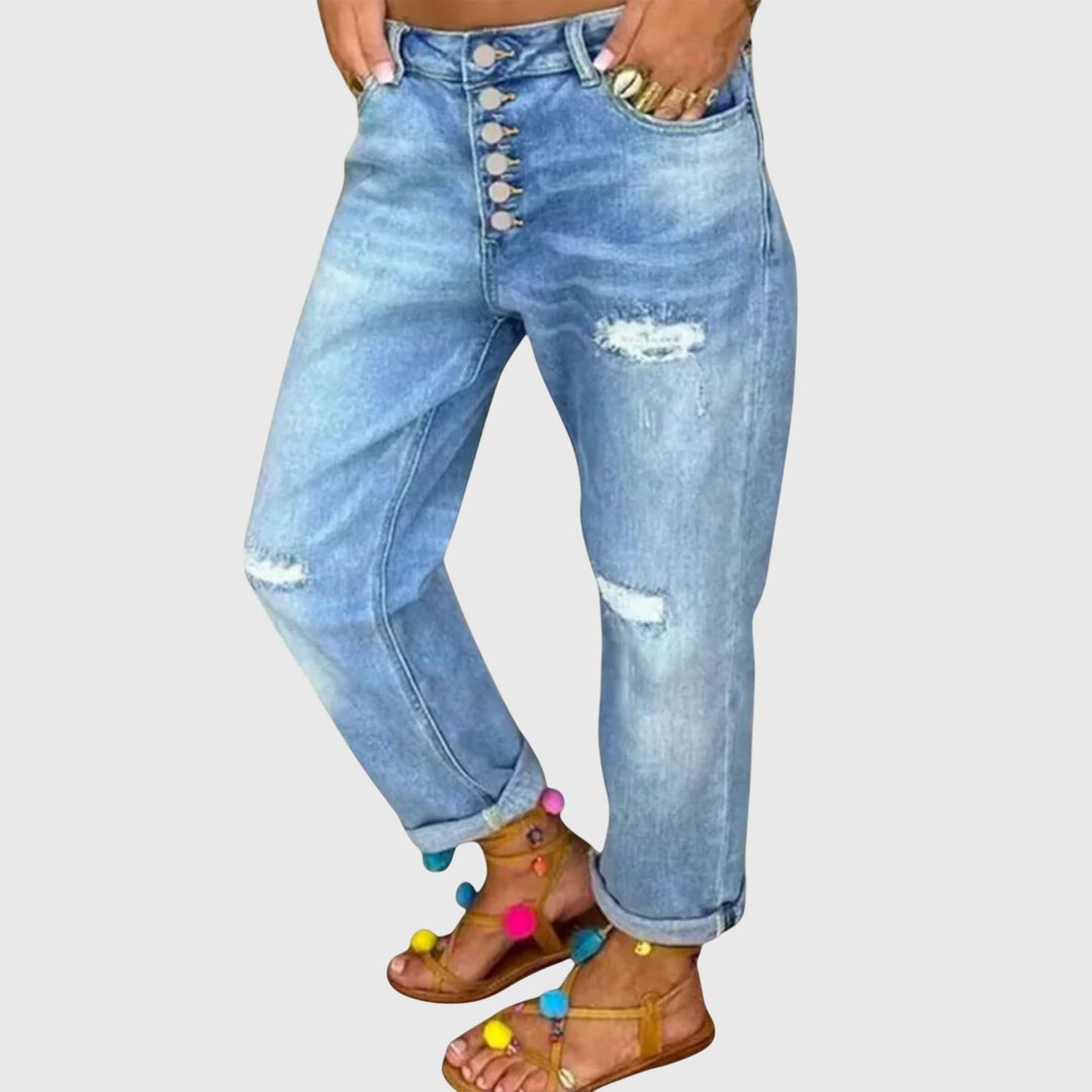 Stylish women's baggy blue jeans, loose fit for a comfortable spring look & effortless everyday wear.