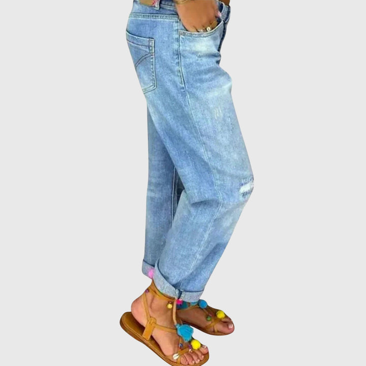 Effortlessly stylish women's baggy blue jeans. Loose fit pants perfect for casual spring fashion & comfort.