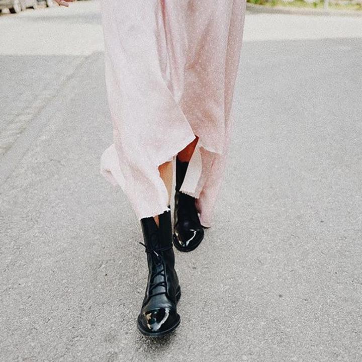 Pair of women's sturdy leather ankle boots with anti-slip sole, ideal for cold and wet weather conditions.