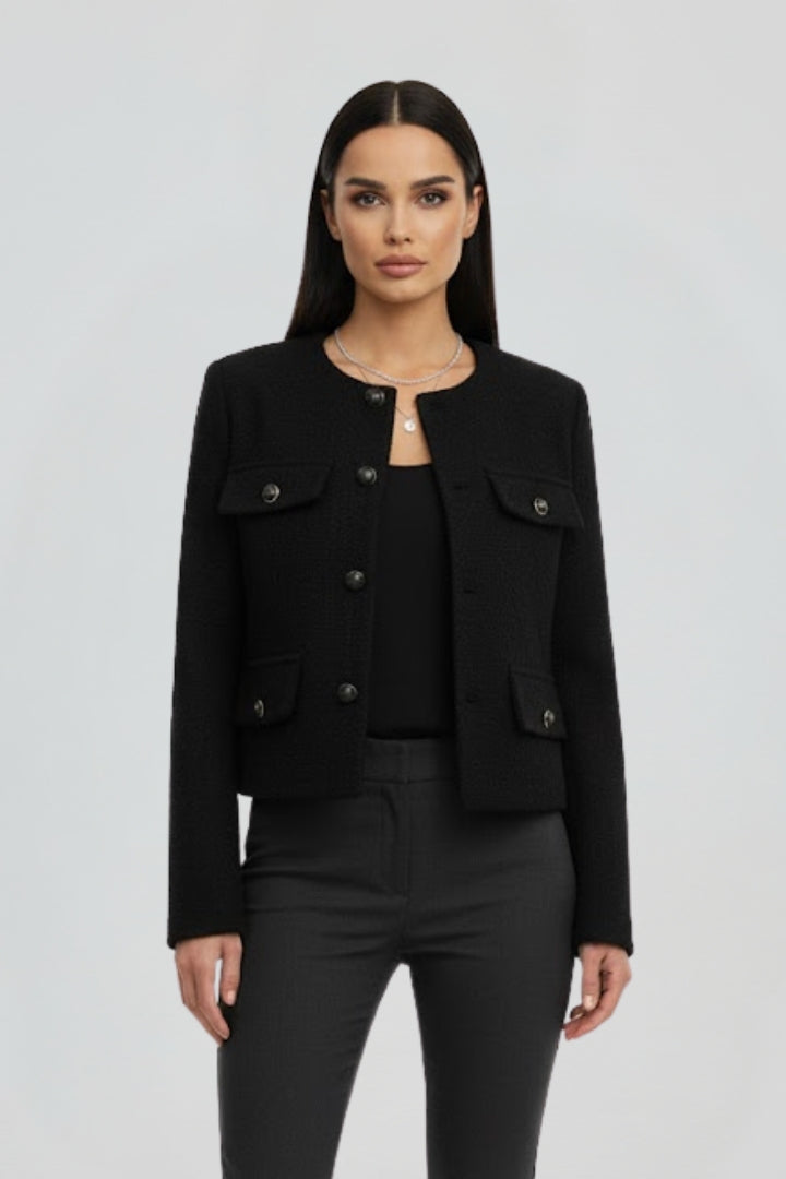 Women's cropped jacket, long sleeve, round neck, button front. Stylish outerwear for modern fashion.