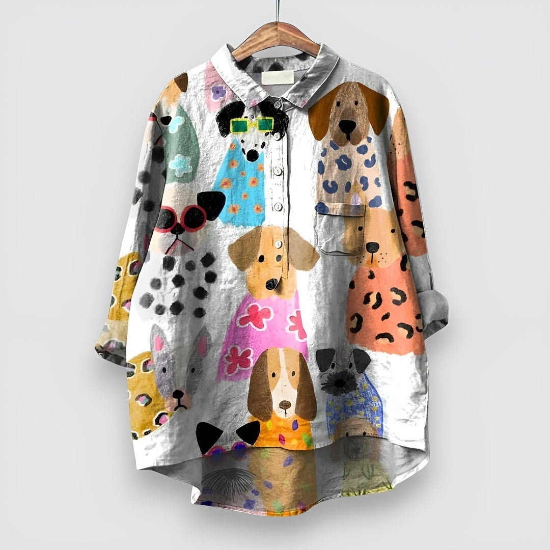Elegant dog print women's blouse with button-up front and long sleeves. A chic collared casual top for animal lovers.