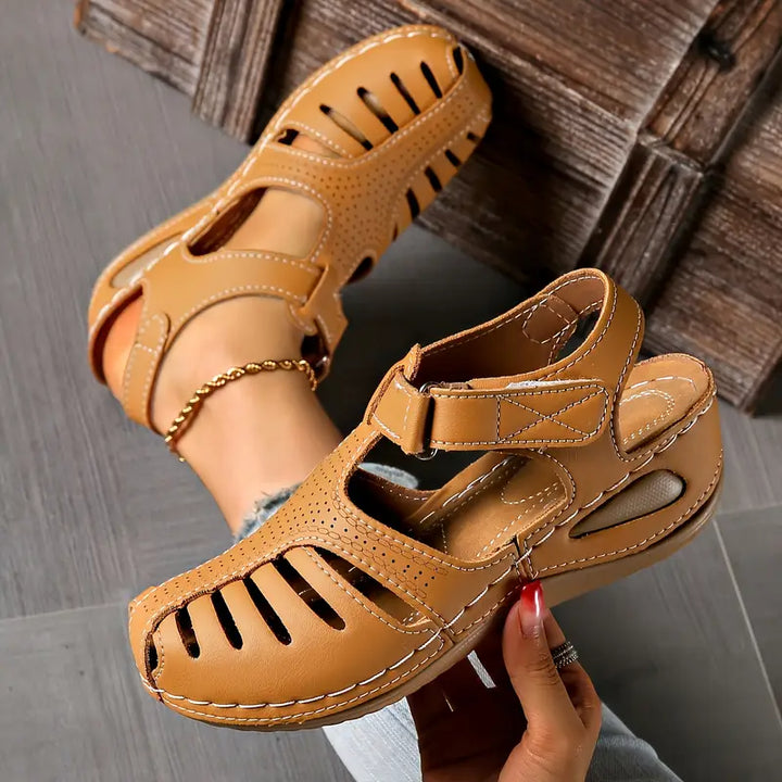 Lightweight women's casual sandals with an open toe, offering stylish comfort for summer everyday wear.