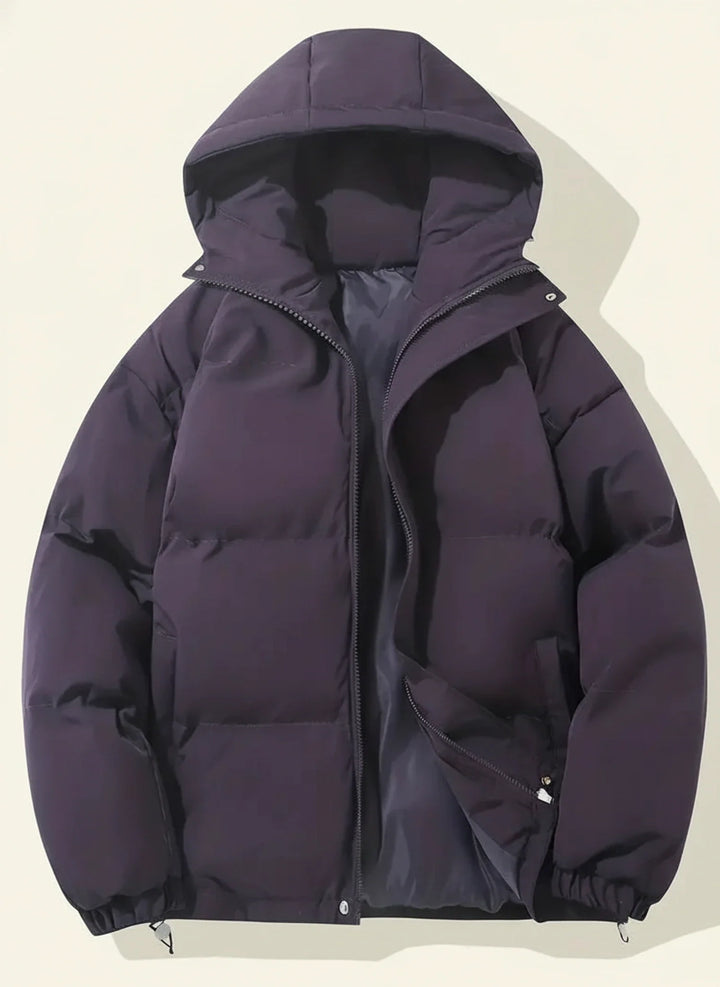 Quilted women's puffer winter coat with hood, offering insulated warmth and chic style for ladies.