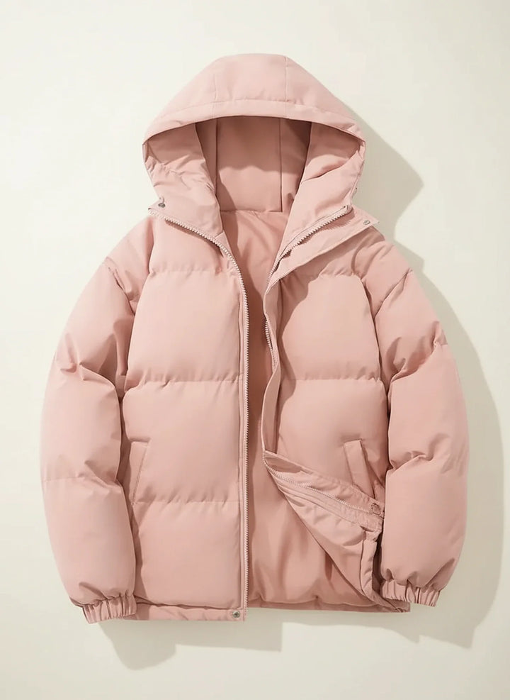 Fashionable women's winter puffer jacket, providing warmth and protection from cold weather elements.