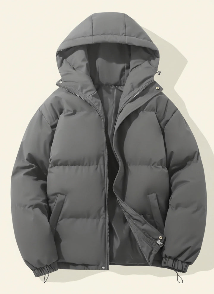 Premium women's hooded puffer winter jacket, combining insulated warmth with modern style for cold weather.