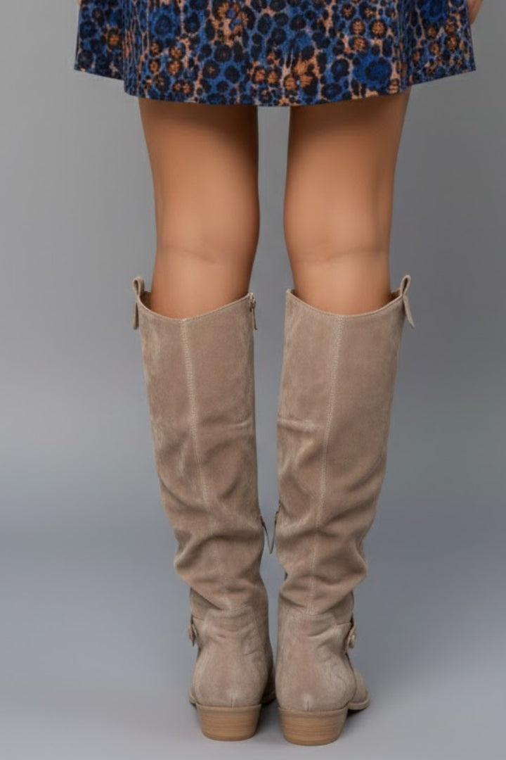 Fashionable green women's knee-high boots, comfortable flat heel, great for fall & winter outfits.