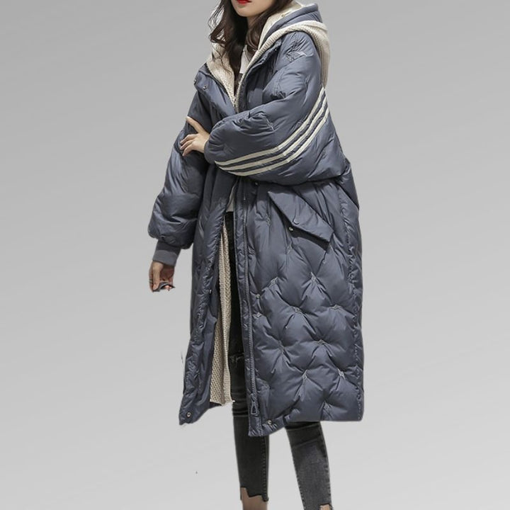 Stylish women's long padded jacket, ideal for ultimate winter warmth & everyday cold weather wear.