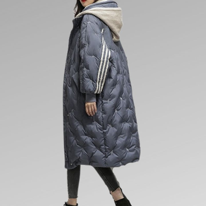 Cozy women's insulated long padded jacket, perfect warm outerwear for extreme winter cold.