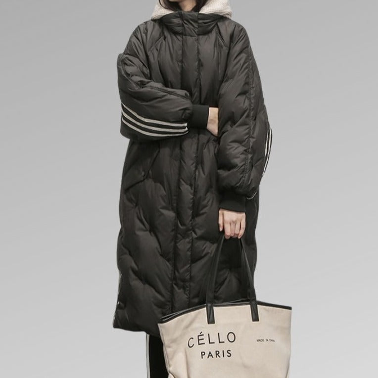 Warm women's long padded winter coat, designed for ultimate cold weather protection & stylish comfort.