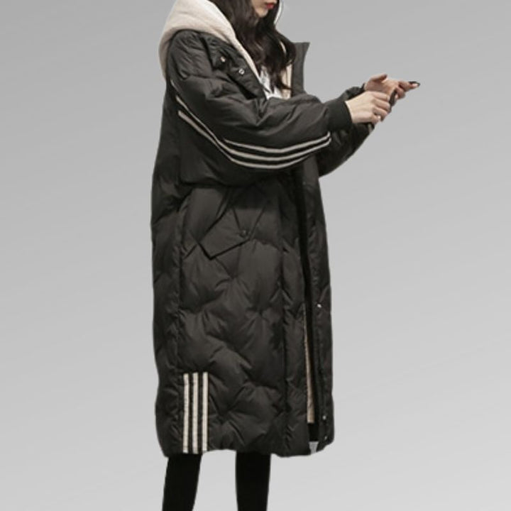 Elegant women's long padded jacket, offering ultimate winter warmth & protection against harsh cold.