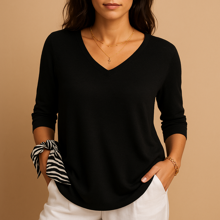 Relaxed fit women's top, modern design. Effortless chic blouse for comfort, casual wear, and everyday fashion.