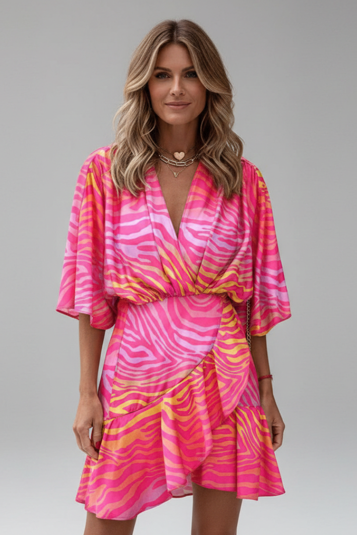 Women's stylish mini dress. V-neckline & batwing sleeves complement the adjustable waist for comfort.