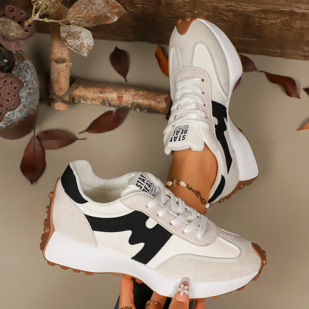 Stylish women's platform lace-up athletic sneakers, comfortable for daily wear.