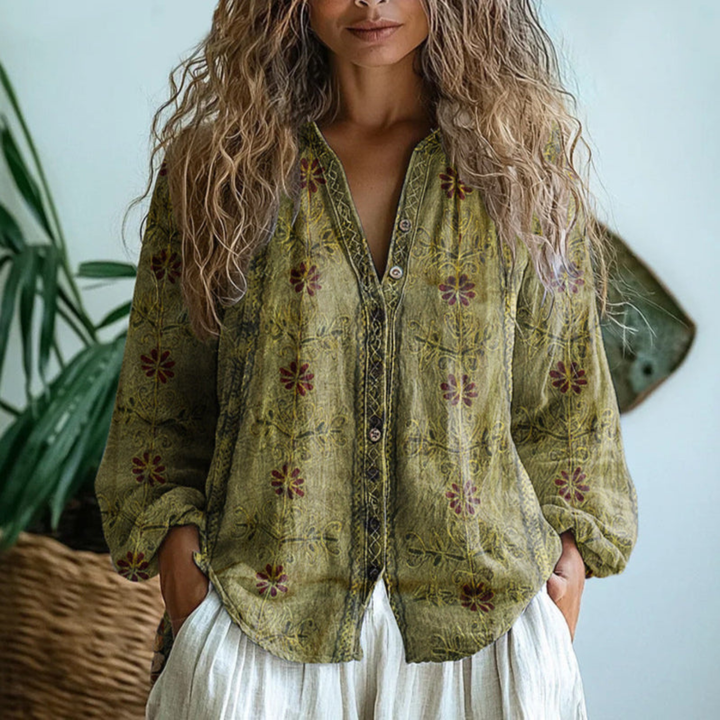 Versatile women's olive green long sleeve button-down blouse. Stylish, comfortable top for everyday casual wear.