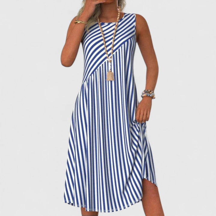Stylish women's striped sleeveless midi dress. Ideal for summer, beach, or casual wear, with a flattering A-line silhouette.