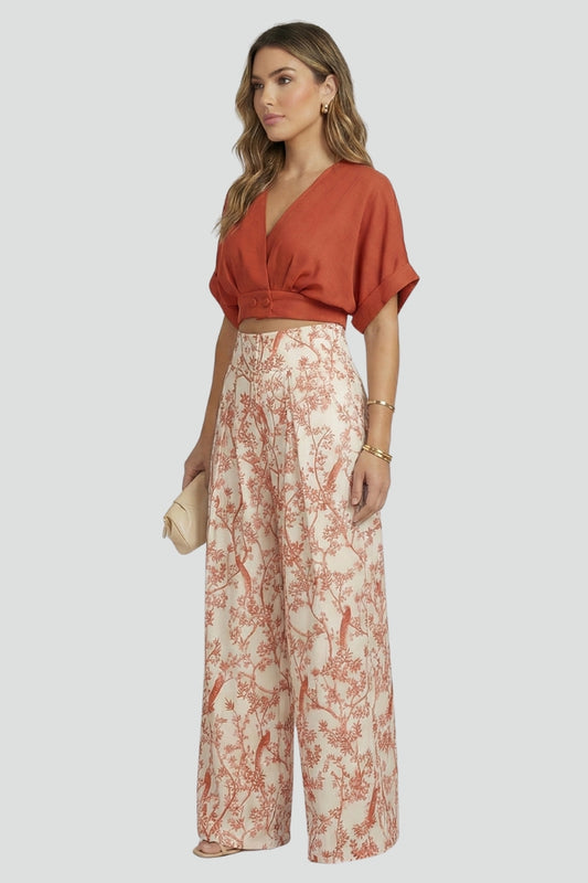 Trendy women's V-neck top and wide-leg trousers two-piece set. Casual chic, comfortable fit, ideal for summer fashion.