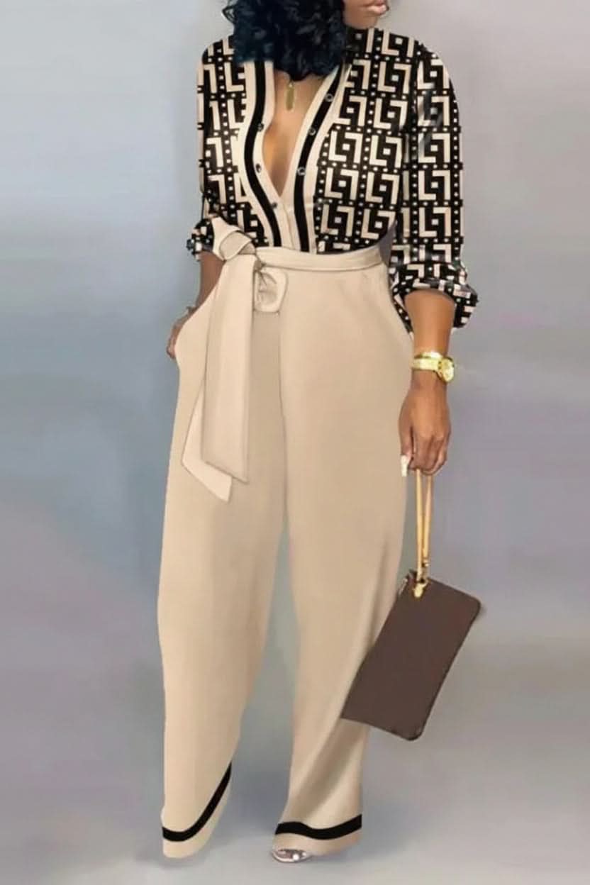 Stylish women's V-neck jumpsuit in black, a comfortable and chic one-piece outfit perfect for casual or travel wear.