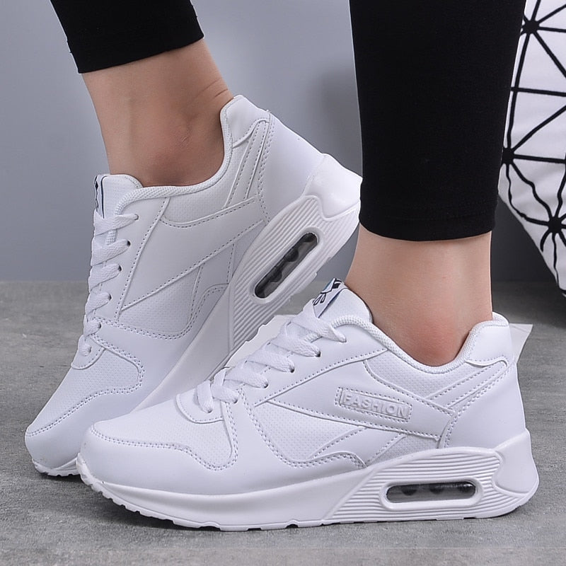 White Valencia women's chunky platform sneakers. Clean vegan leather design, perfect for everyday trendy fashion.
