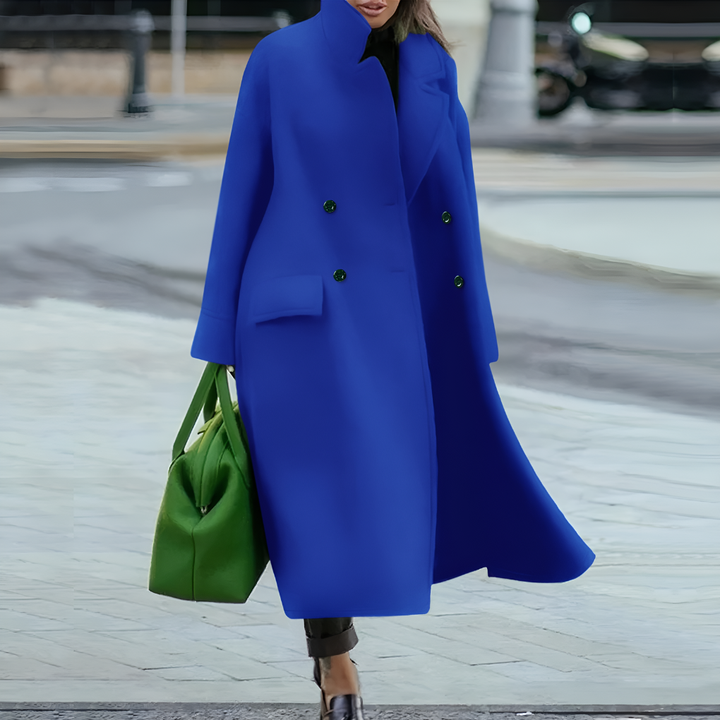 Loose fit women's waterproof long rain coat, practical & stylish everyday outerwear.