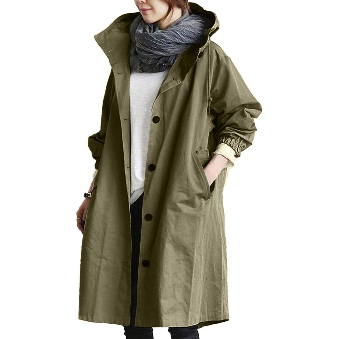 Stylish women's waterproof long trench coat for elegant all-weather outdoor protection.
