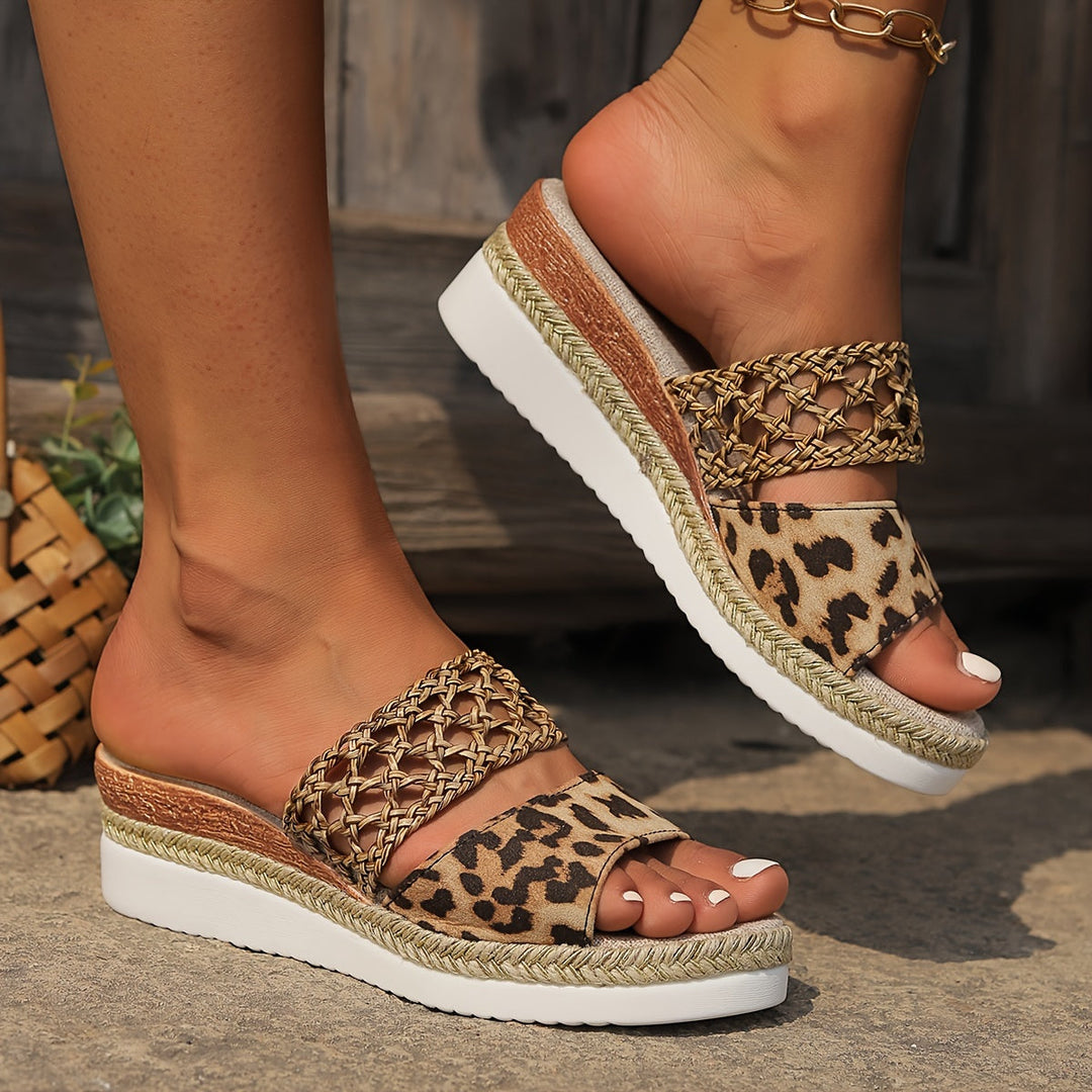 Achieve an effortless summer look with these stylish women's woven platform wedge sandals.