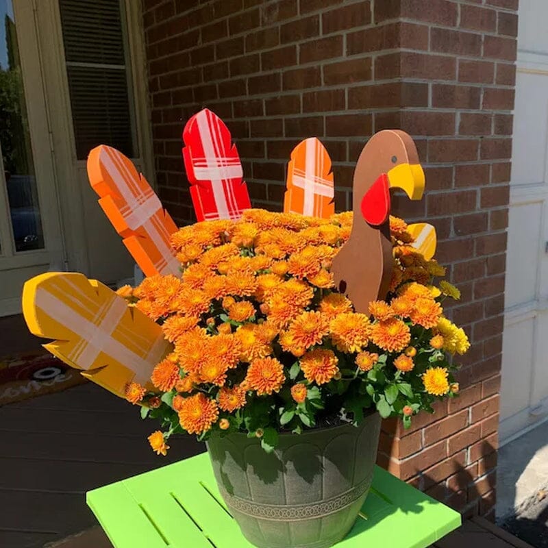 Outdoor fall decor: a charming Thanksgiving turkey planter stake for autumn gardens