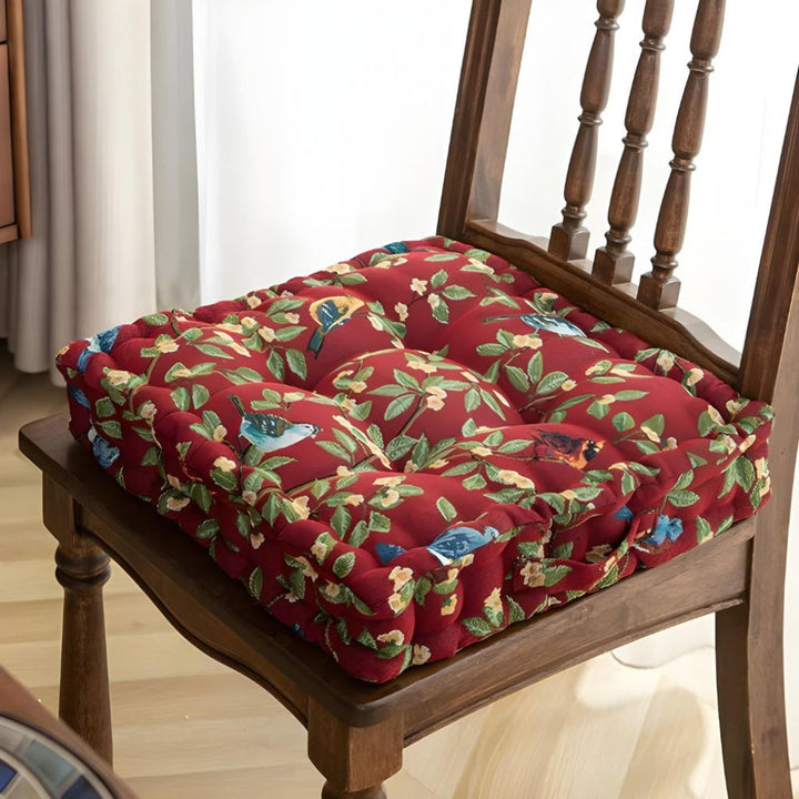 Beige polyester thick seat cushion for patio chairs, providing comfortable indoor & outdoor seating.