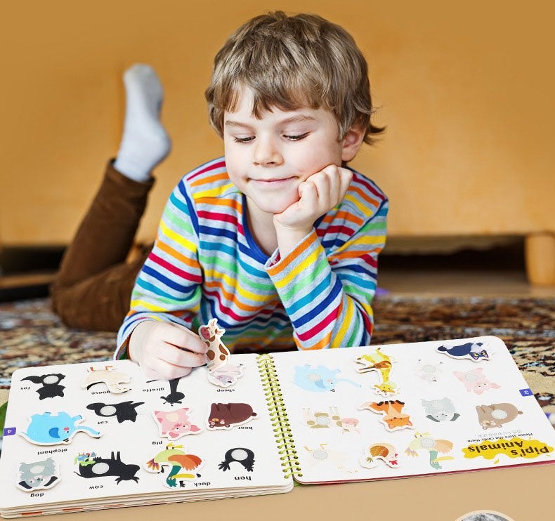 Toddler Activity Busy Book opened to a puzzle page, fostering problem-solving and fine motor skills