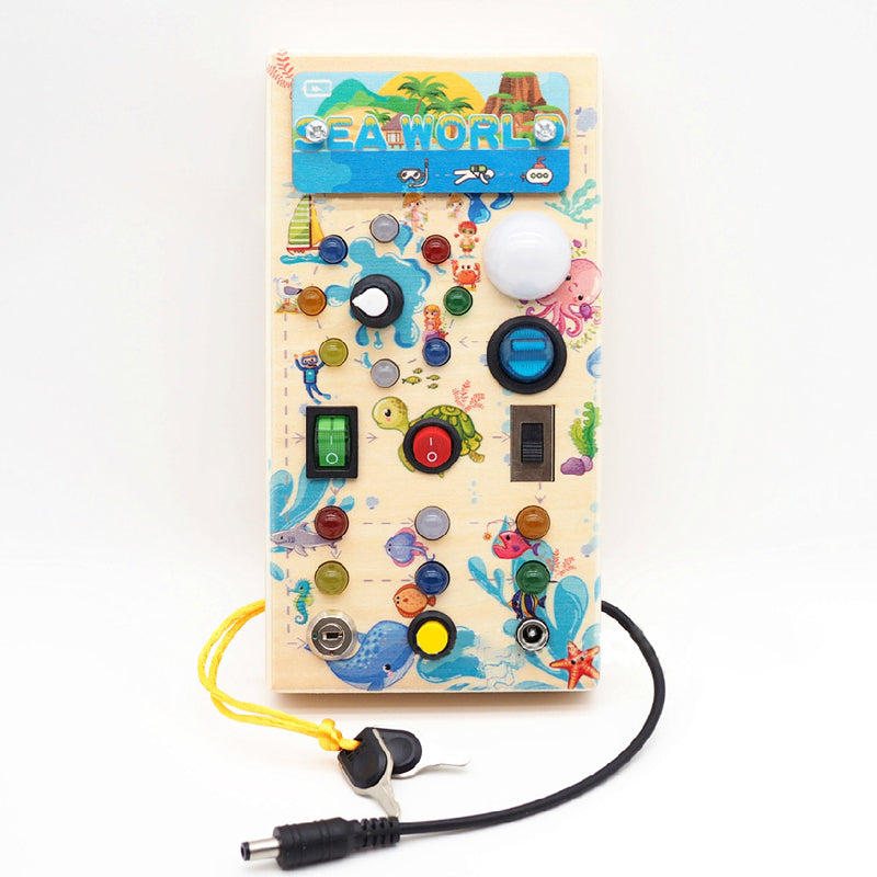 Detail of a light-up switch on a Toddler LED Montessori Busy Board