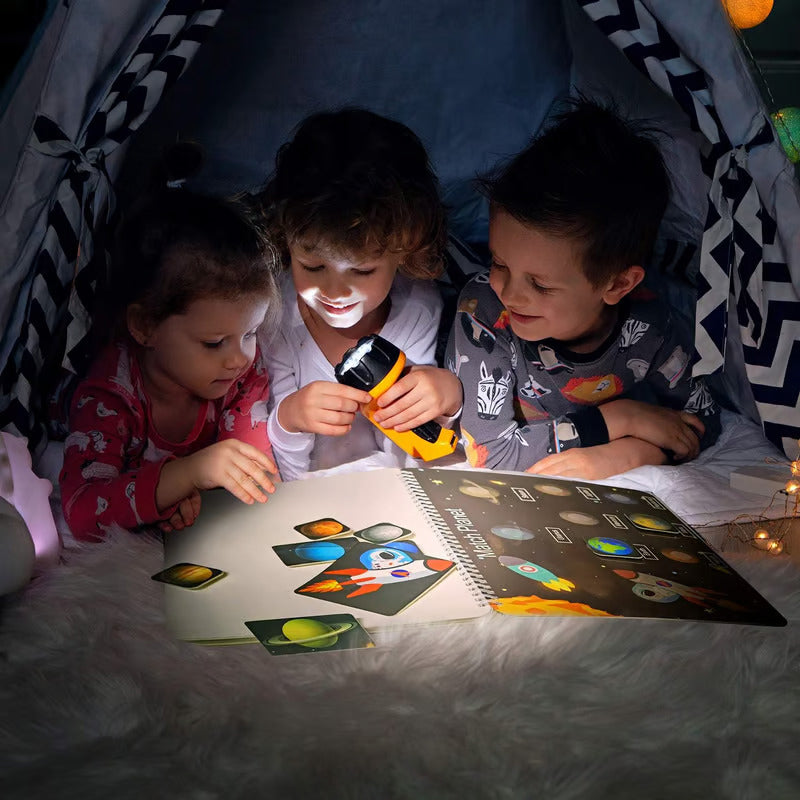 Toddler learning busy book with bright illustrations, open to a page with color sorting for cognitive development
